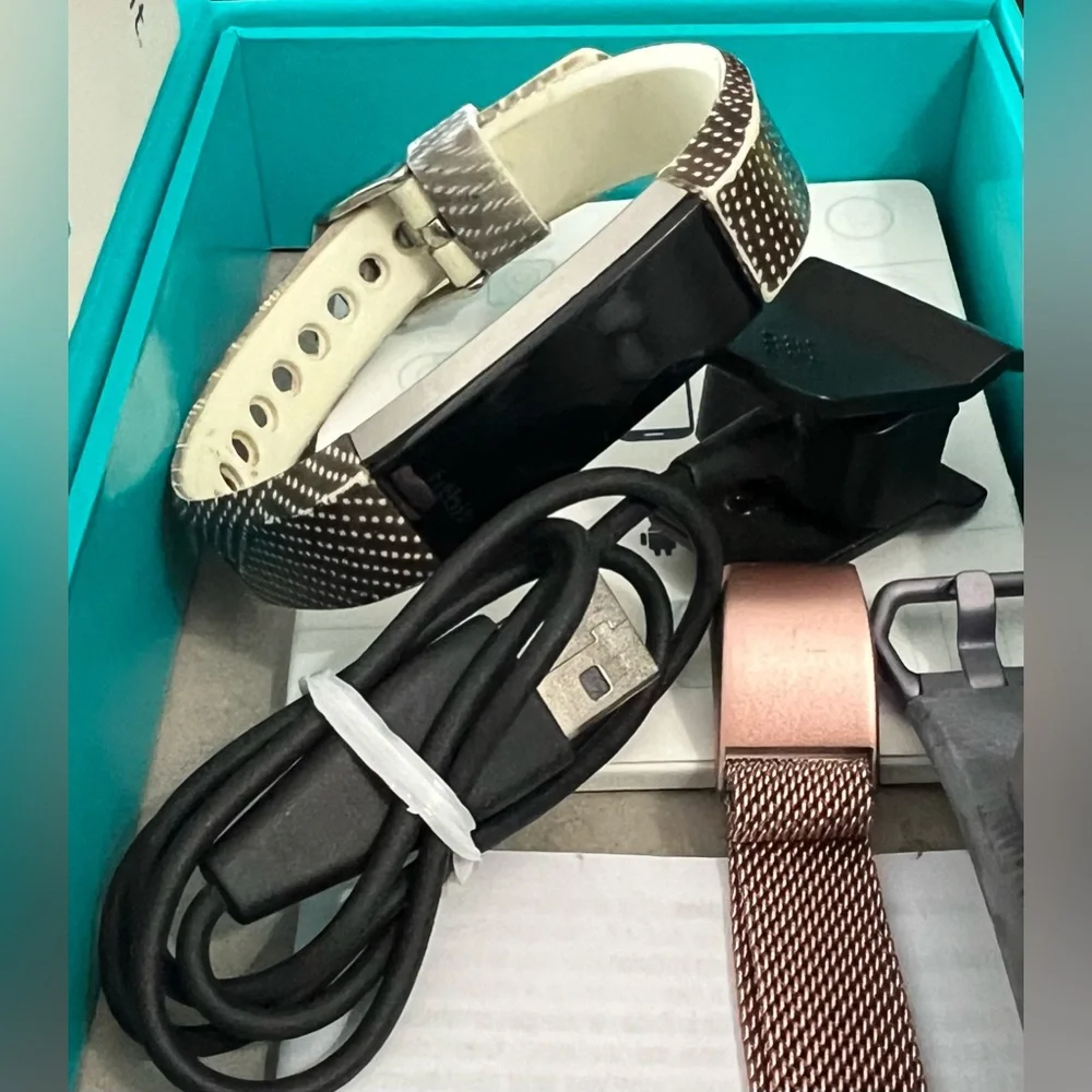 Fitbit Black Fitness Wristband S-L, includes multiple bands.